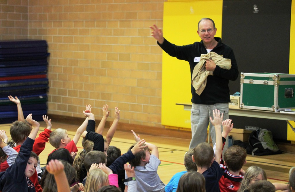 Bill asks the kids 'Who loves snakes and turtles?' before he reveals 4 Corn snakes.